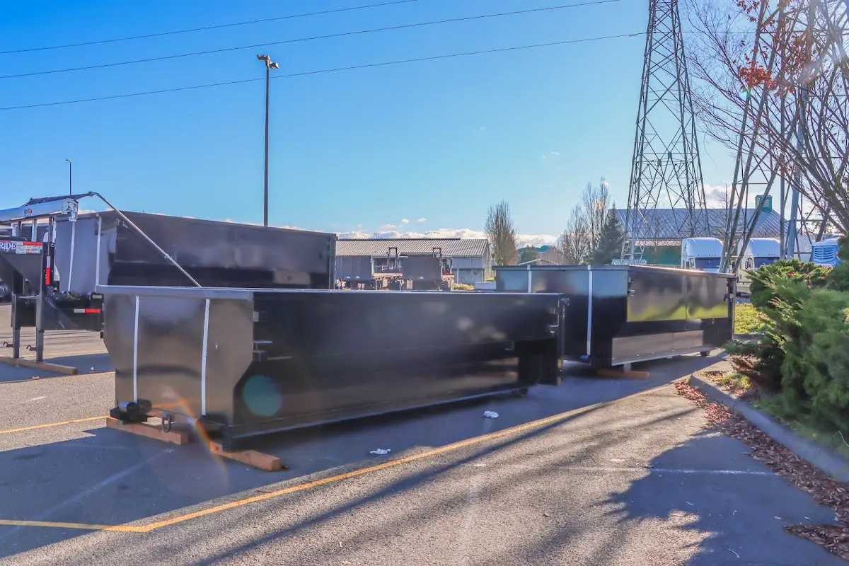 Roll-off dumpster ready for waste disposal at job site for 2 Yard Dumpster Rental in South Elgin
